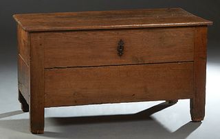 French Provincial Carved Oak Coffer, 19th c., the three board top over a two board front, on block feet, H.- 27 1/2 in., W.- 49 in., D.- 23 1/2 in.