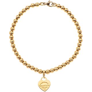 18K YELLOW GOLD BRACELET, TIFFANY & CO., RETURN TO TIFFANY COLLECTION Weight: 8.6 g. Length: 17.5 cm