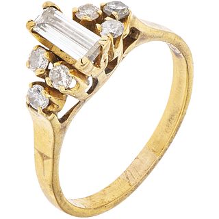 18K YELLOW GOLD RING WITH DIAMONDS 1 Trapezoid baguette cut diamonds ~0.35 ct and 6 Brilliant cut diamonds ~0.30 ct