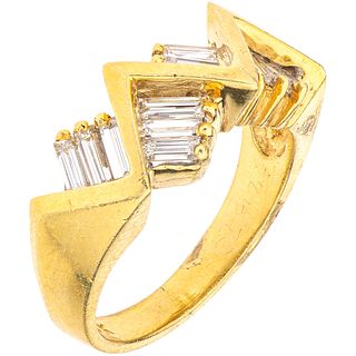 RING WITH DIAMONDS IN 18K YELLOW GOLD 12 Baguette cut diamonds ~0.65 ct. Weight: 7.6 g. Size: 6 ½