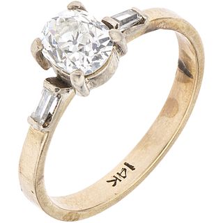 RING WITH DIAMONDS IN 10K YELLOW GOLD 1 Antique cut diamond ~0.45 ct, 2 Baguette cut diamonds ~0.06 ct. Size: 7 ½