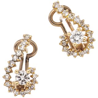 PAIR OF EARRINGS WITH DIAMONDS IN 14K YELLOW GOLD 36 8x8 and brilliant cut diamonds ~1.18 ct. Weight: 3.9 g. Size: 0.35 x 0.59" (0.9 x 1.5 cm)