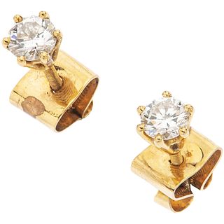 PAIR OF STUD EARRINGS WITH DIAMONDS IN 18K YELLOW GOLD 2 brilliant cut diamonds ~0.40 ct Clarity: VS2 - SI1 Color: J-K