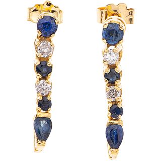 PAIR OF EARRINGS WITH SAPPHIRES AND DIAMONDS IN 10K YELLOW GOLD 8 Round and pear cut sapphires ~0.70 ct, 4 Brilliant cut diamonds