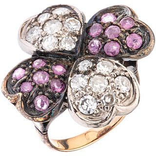 RING WITH RUBIES AND DIAMONDS IN 10K PINK GOLD AND PALLADIUM SILVER  14 Round cut rubies ~0.95 ct, 14 Diamonds (different cuts)