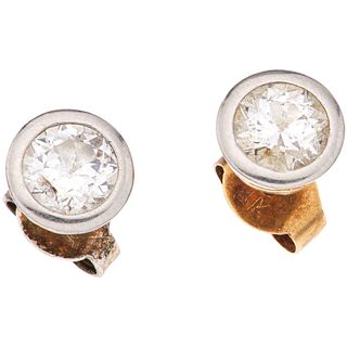 PAIR OF STUD EARRINGS WITH DIAMONDS IN 18K YELLOW GOLD 2 Antique cut diamonds ~1.20 ct. Clarity: SI2-I2. Color: I-J