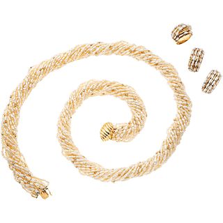 SET OF NECKLACE, RING AND PAIR OF EARRINGS WITH CULTIVATED PEARLS IN 14K YELLOW GOLD 19 Strands of rain grain cream colored pearls