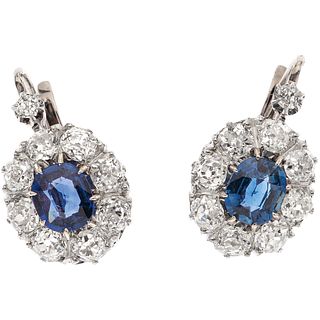PAIR OF SAPPHIRE AND DIAMOND EARRINGS IN 18K PINK GOLD AND PLATINUM 2 Oval cut sapphires ~1.30ct, 18 Antique cut diamonds~1.25ct