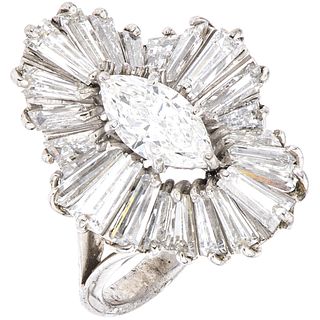 DIAMOND RING IN PALLADIUM SILVER 1 Marquise cut diamond ~1.0 ct Clarity: VS2-SI1, 24 Trapezoid baguette cut diamonds