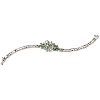 BRACELET WITH EMERALDS AND DIAMONDS IN PALLADIUM SILVER 21 Round and marquise cut emeralds ~1.50 ct, 17 Diamonds (different cuts)