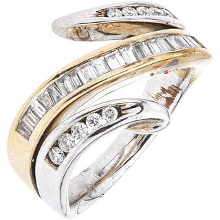 RING WITH DIAMONDS IN 14K WHITE AND YELLOW GOLD 10 Brilliant cut diamonds ~0.20 ct, 21 Diamonds (different cuts) Size:7