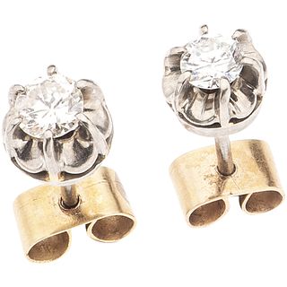 PAIR OF STUD EARRINGS WITH DIAMONDS, 18K WHITE AND YELLOW GOLD 2 Brilliant cut diamonds ~0.61 ct Clarity: SI2- I1 Color: J-K