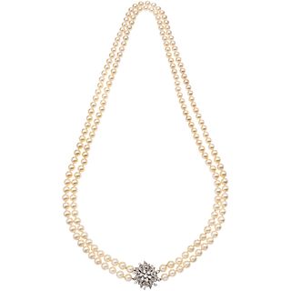 NECKLACE WITH CULTIVATED PEARLS, PALLADIUM SILVER CLASP, DIAMONDS 2 Strands of cream colored pearls, 107 Diamonds (different cuts)