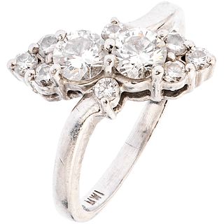 RING WITH DIAMONDS IN PLATINUM 2 Brilliant cut diamonds ~0.65 ct Clarity: SI1-SI2, 8 Brilliant cut diamonds, Size: 6