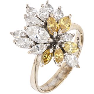 RING WITH DIAMONDS IN 16K WHITE GOLD 16 Marquise cut yellow and white diamonds ~0.75 ct. Weight: 5.2 g. Size: 6 ¼
