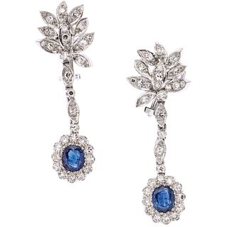 PAIR OF EARRINGS WITH SAPPHIRES AND DIAMONDS IN 10K WHITE GOLD 2 Oval cut sapphires ~1.60 ct, 64 8x8 cut diamonds ~1.75 ct
