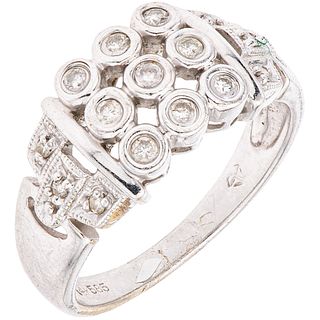 RING WITH DIAMONDS IN 14K WHITE GOLD 15 Brilliant cut diamonds ~0.15 ct. Weight: 4.6 g. Size: 7 ¼