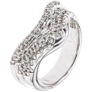 RING WITH DIAMONDS IN 14K WHIT GOLD 39 Brilliant cut diamonds ~0.39 ct. Weight: 7.2 g. Size: 7 ¼