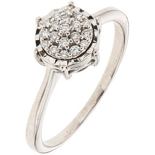 RING WITH DIAMONDS IN 14K WHITE GOLD 19 Brilliant cut diamonds ~0.19 ct. Weight: 2.9 g. Size: 7 ¾
