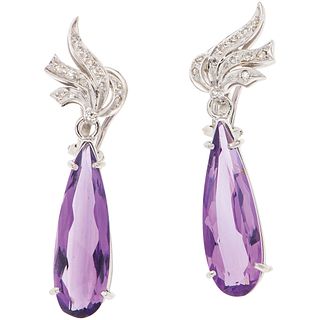 PAIR OF EARRINGS WITH AMETHYSTS AND DIAMONDS IN PALLADIUM SILVER 2 Pear cut amethysts, 24 8x8 cut diamonds ~0.16 ct. Weight: 9.0 g