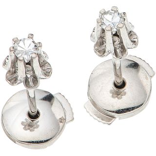 PAIR OF STUD EARRINGS WITH DIAMONDS IN 14K WHITE GOLD 2 8x8 cut diamonds ~0.08 ct. Weight: 1.0 g. Diameter: 0.15" (0.4 cm)