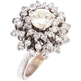RING WITH DIAMONDS IN PALLADIUM SILVER 1 Brilliant cut diamond ~0.50 ct Clarity: SI2-I1, 36 8x8 cut diamonds. Size: 4 ¾
