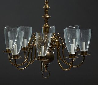 Dutch Baroque Style Burnished Brass Eight Light Chandelier, 20th c., the knopped support to a platform issuing eight scrolled arms with bobeches and c