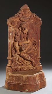 Large Cast Iron Wall Fountain, 20th c., the arched back with a relief figure of a classical man wrestling a serpent, above a lower shaped basin, H.- 6