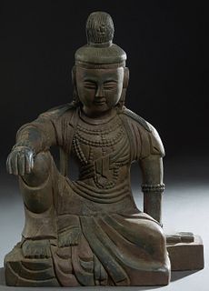 Chinese Carved Wood Seated Buddha, late 19th c., with traces of original polychromy, H.- 23 3/4 in., W.- 18 in., D.- 10 3/4 in.