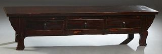 Chinese Kang Style Carved Walnut Low Table, late 19th c., the rectangular top over three frieze drawers, on flat cabriole legs, H.- 19 in., W.- 80 in.