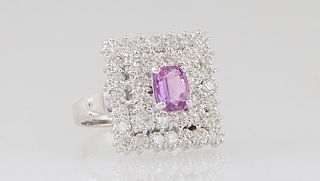 Lady's 18K White Gold Dinner Ring, with a central 1.08 ct. oval pink sapphire atop double concentric graduated squares of round diamonds, the shoulder