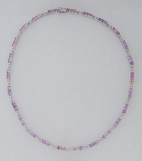 18K White Gold Link Necklace, each of the 25 links with three round pink sapphires joined by diamond mounted infinity links, total sapphire wt.- 15.6 