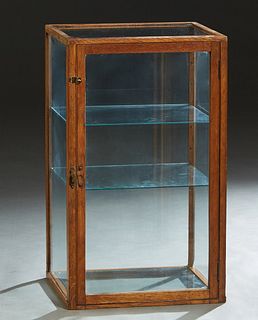 American Carved Oak Table Top Display Case, c. 1900, with a glass top, sides  and bottom, with two interior glass shelves, H.- 30 in., W.- 17 3/4 in.,