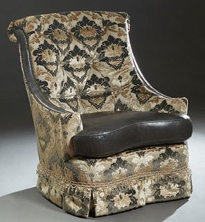 Unusual Custom Made Leather and Fabric Swivel Chair, 20th c., the tufted canted rolled high back to arms with leather inserts, over a removable leathe