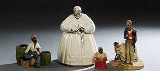 Four Pieces of Black American Memorabilia, 20th c., consisting of a ceramic "mammy" cookie jar; an English "Little Scamp" chalkware figural group; a c