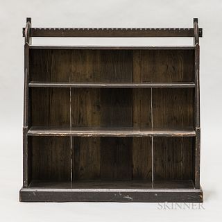 Small Gothic-style Arts and Crafts Oak Bookcase, early 20th century, four graduated shelves supported by sides with stepped, sloped and curved edges, 