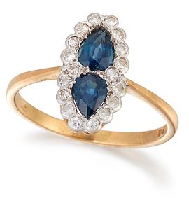 AN 18 CARAT GOLD SAPPHIRE AND DIAMOND CLUSTER RING, two pea