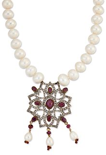 A RUBY, WHITE PASTE AND CULTURED PEARL PENDANT NECKLACE, an
