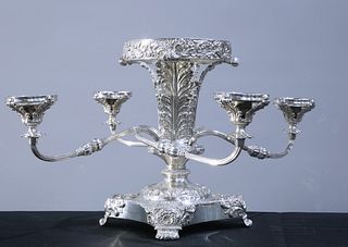 AN OLD SHEFFIELD PLATE EPERGNE, the central vase with leaf-