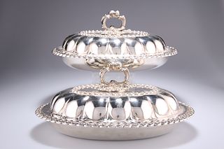 A PAIR OF 19TH CENTURY SILVER-PLATED ENTREE DISHES, oval, w