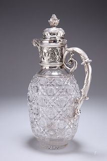 A SILVER-PLATE MOUNTED CUT-GLASS CLARET JUG, the hinged dom