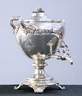 A 19TH CENTURY SILVER-PLATED TEA URN, the domed cover with 