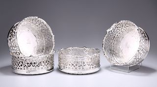 AN EXCEPTIONAL SET OF FOUR EARLY VICTORIAN SILVER COASTERS,