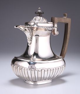A LATE VICTORIAN SILVER HOT WATER JUG, by Elkington & Co, B