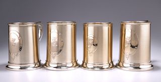 A HARLEQUIN SET OF FOUR VICTORIAN SILVER-GILT PINT MUGS, th