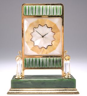 A ROCK CRYSTAL AND NEPHRITE JADE CLOCK, IN THE MANNER OF CA
