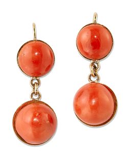 A PAIR OF CORAL PENDANT EARRINGS, each round red coral in a