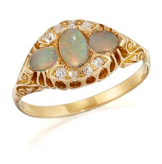 A VICTORIAN OPAL AND DIAMOND RING, three oval opals within 