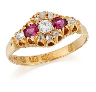 A VICTORIAN 18 CARAT GOLD RUBY AND DIAMOND CLUSTER RING, an