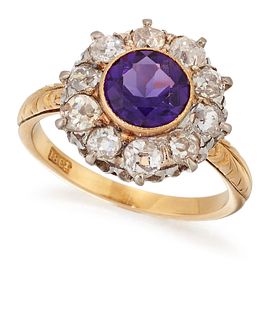 AN AMETHYST AND DIAMOND CLUSTER RING, a round cut amethyst 
